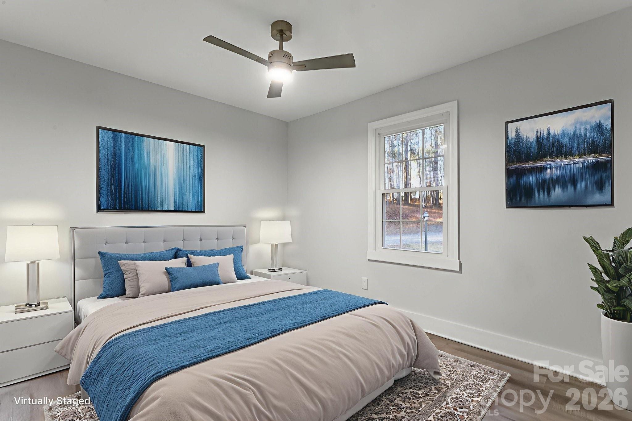 28 Robert Tyson Road Wadesboro, NC 28170 - Photo 14 of 23 a bedroom with a large bed and a window