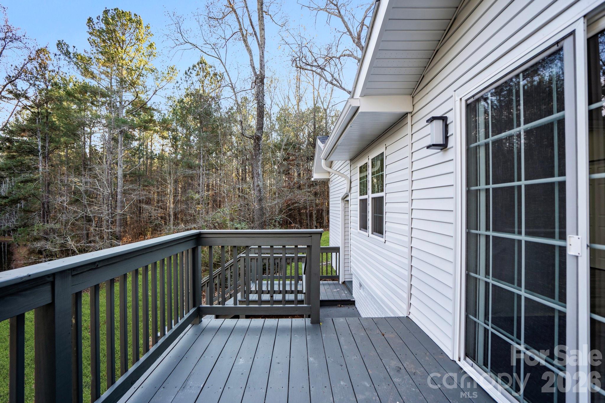 28 Robert Tyson Road Wadesboro, NC 28170 - Photo 17 of 23 a view of a balcony with wooden floor and fence