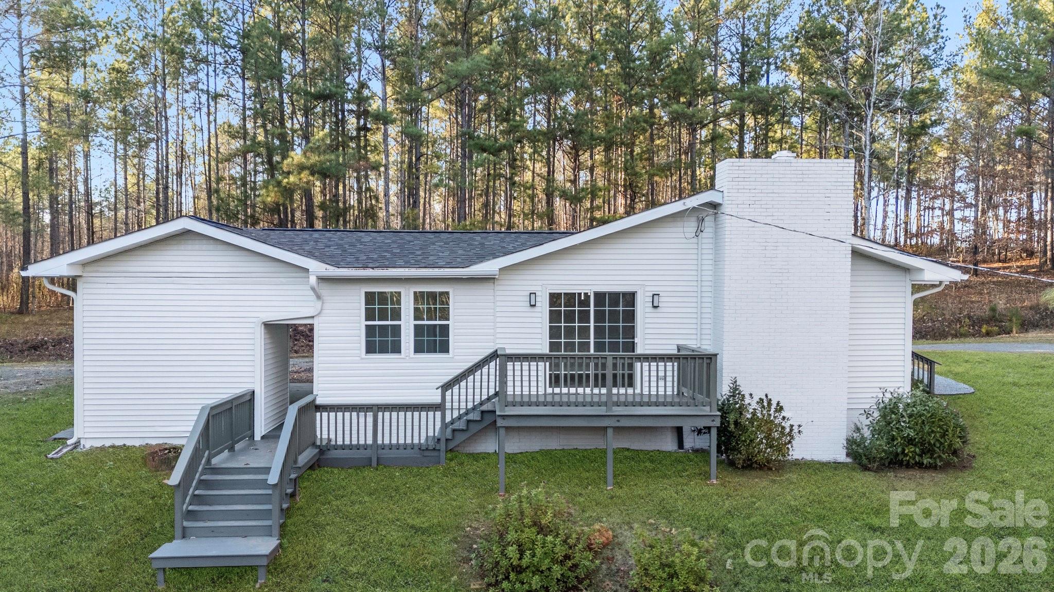 28 Robert Tyson Road Wadesboro, NC 28170 - Photo 18 of 23 a house view with a garden space