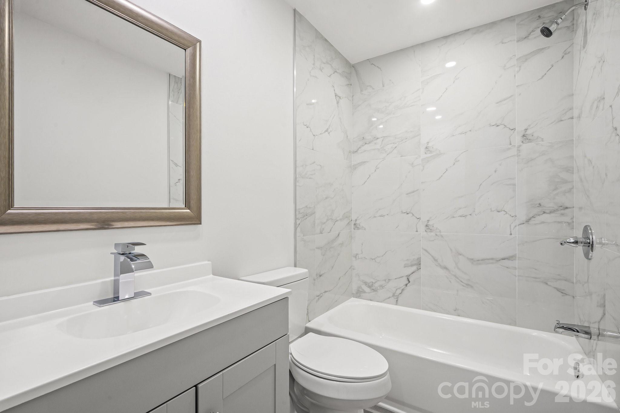 28 Robert Tyson Road Wadesboro, NC 28170 - Photo 10 of 23 a bathroom with a sink a toilet and shower