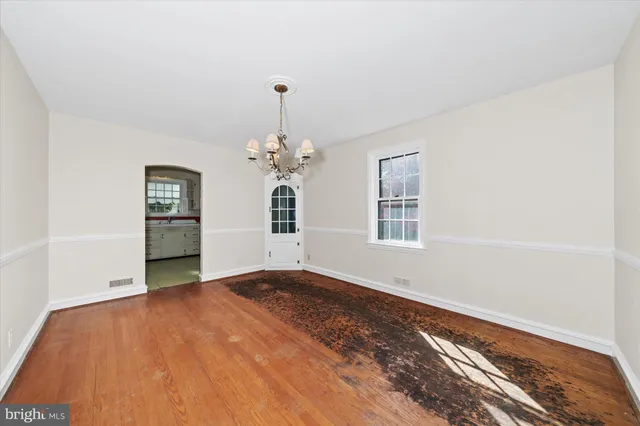 an empty room with windows