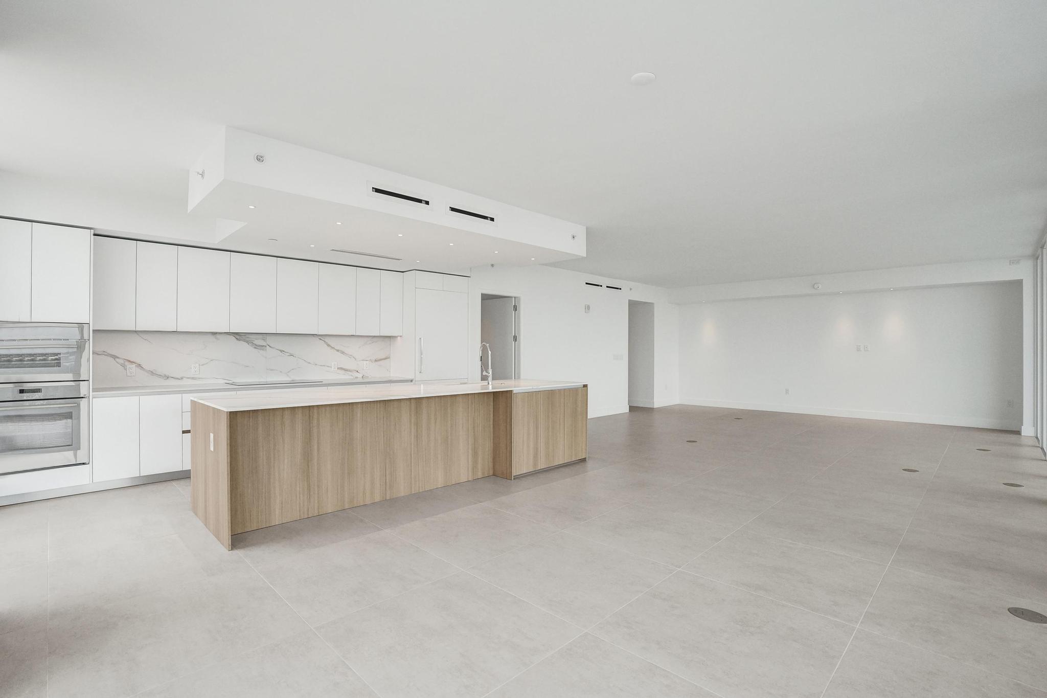 407 North Riverside Drive, Unit 605 Pompano Beach, FL 33062 - Photo 5 of 93 a view of cabinets