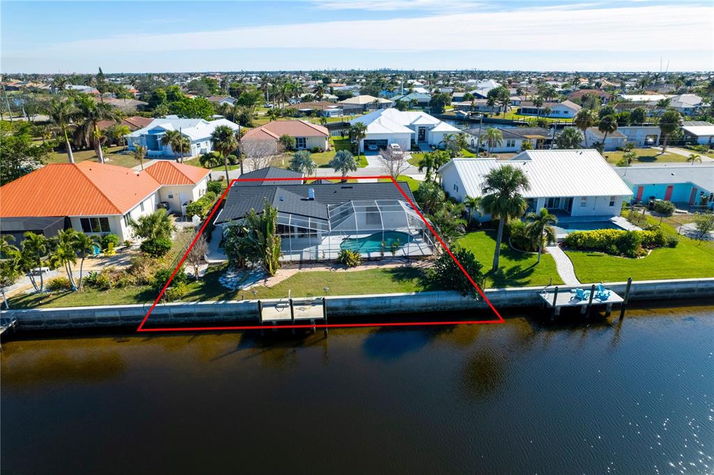 1732 Boca Raton Court Punta Gorda, FL 33950 - Photo 7 of 64 a view of a city with lawn chairs
