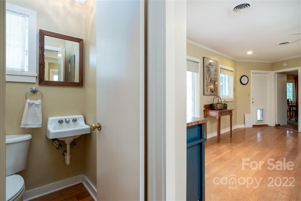 252 Hillbrook Road Tryon, NC 28782 - Photo 21 of 48 a view of a hallway with bathroom and a toilet