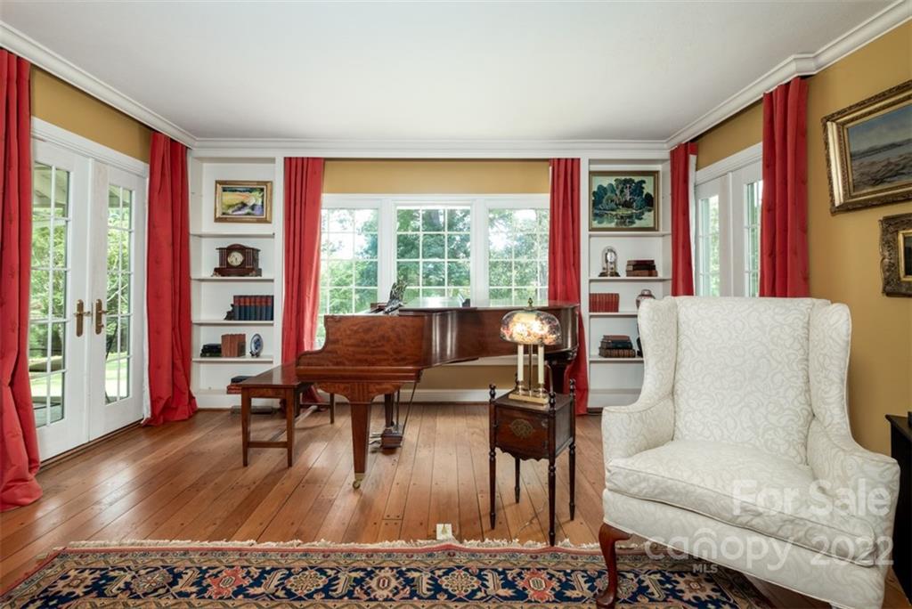 252 Hillbrook Road Tryon, NC 28782 - Photo 23 of 48 a living room with furniture and a large window