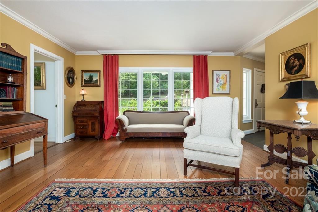 252 Hillbrook Road Tryon, NC 28782 - Photo 25 of 48 a living room with furniture and a large window