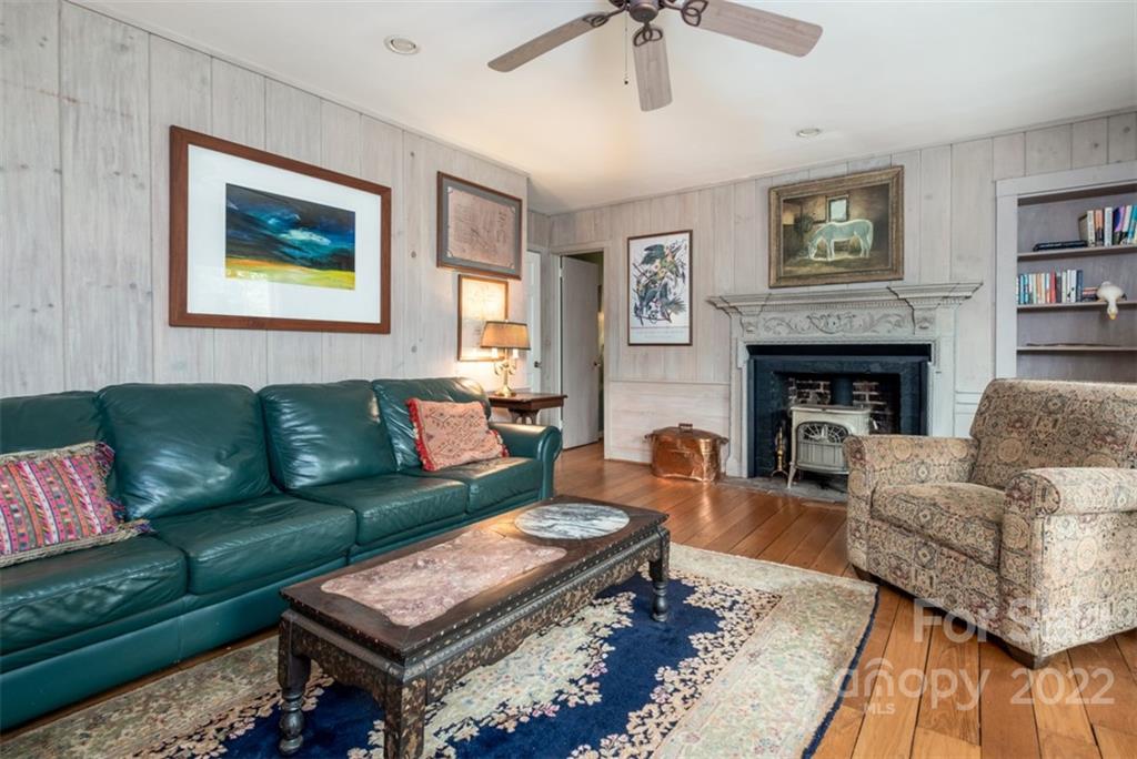 252 Hillbrook Road Tryon, NC 28782 - Photo 27 of 48 a living room with furniture and a fireplace