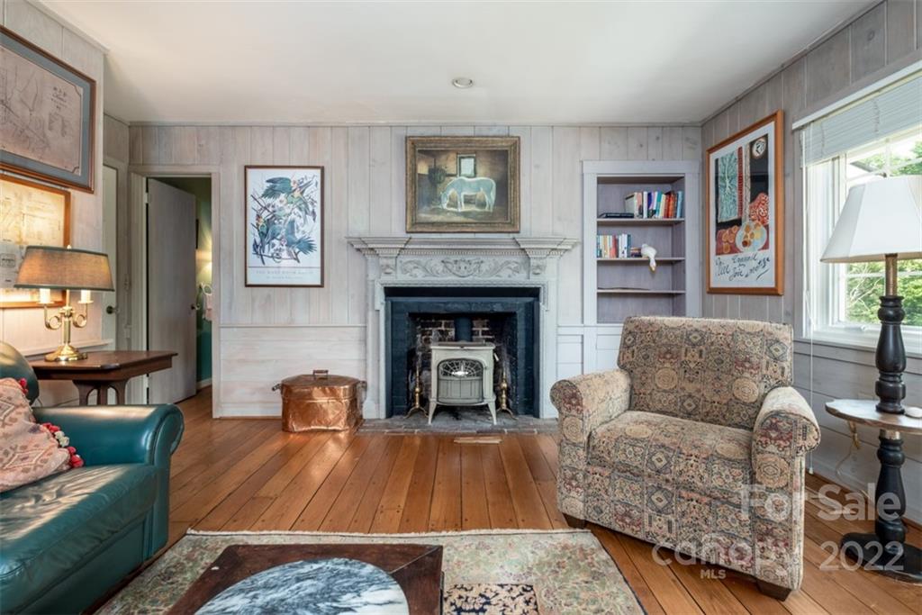 252 Hillbrook Road Tryon, NC 28782 - Photo 28 of 48 a living room with furniture and a fireplace