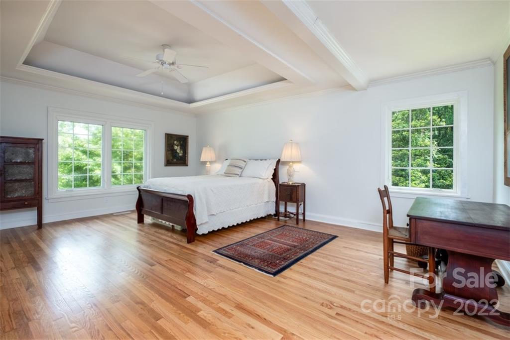 252 Hillbrook Road Tryon, NC 28782 - Photo 30 of 48 a bedroom with a bed and a table