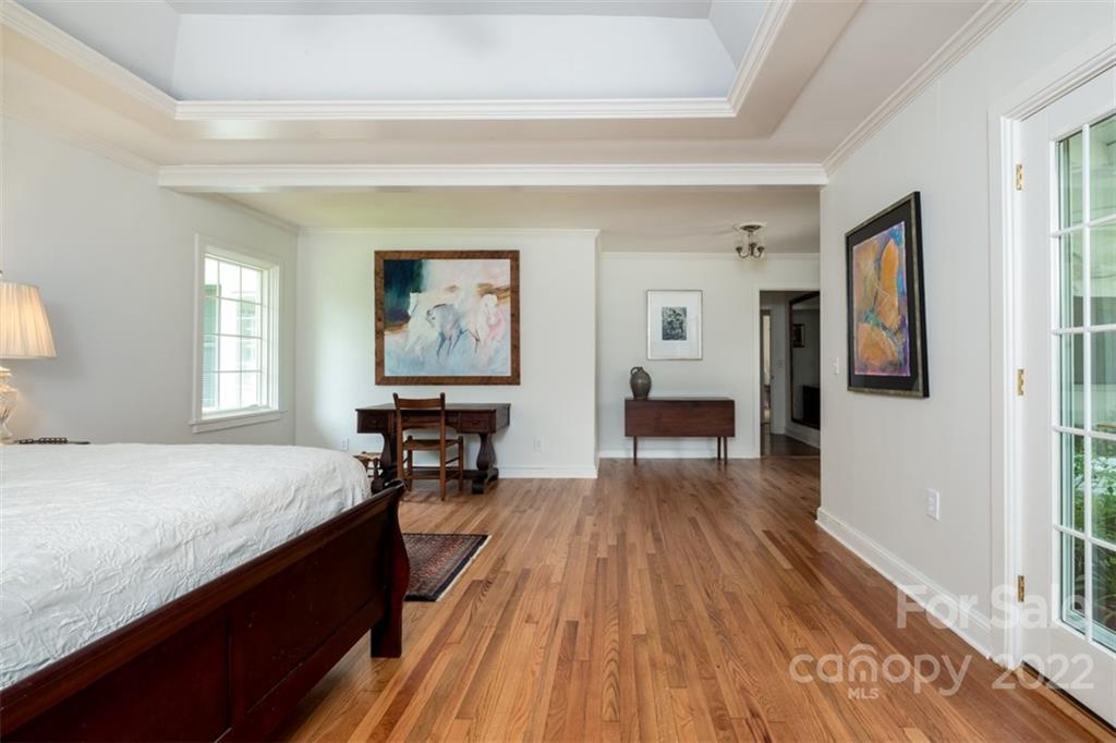 252 Hillbrook Road Tryon, NC 28782 - Photo 31 of 48 a living room with a bed furniture and a window