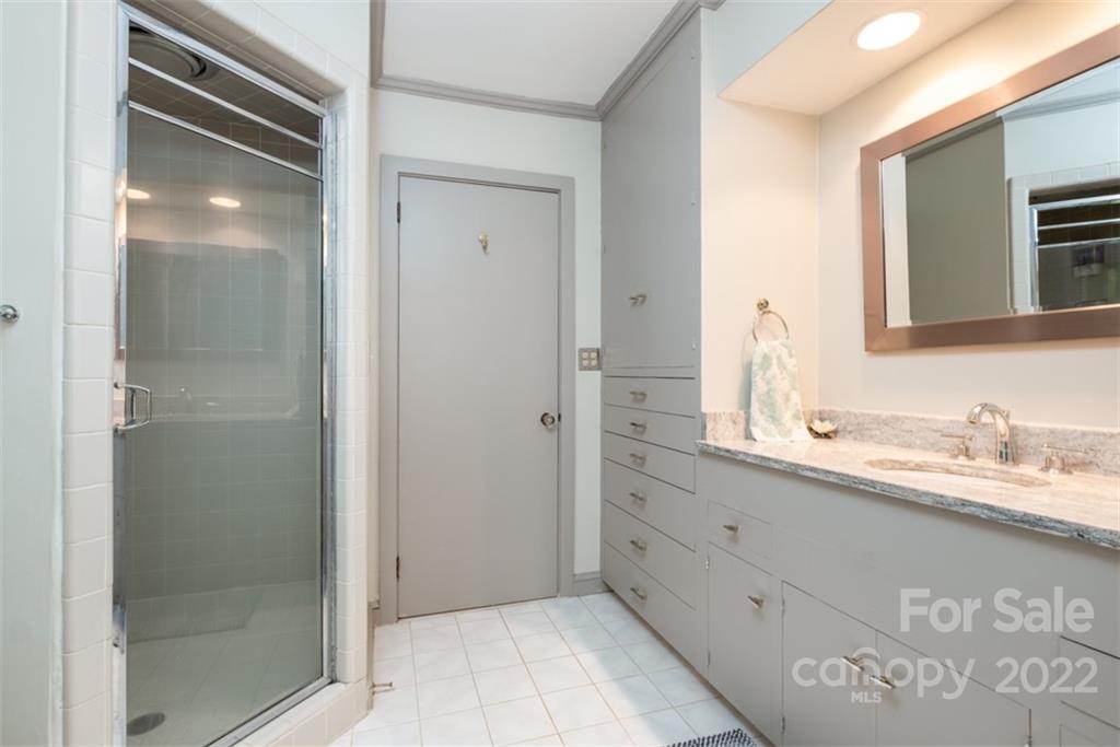 252 Hillbrook Road Tryon, NC 28782 - Photo 36 of 48 a bathroom with a sink and a mirror