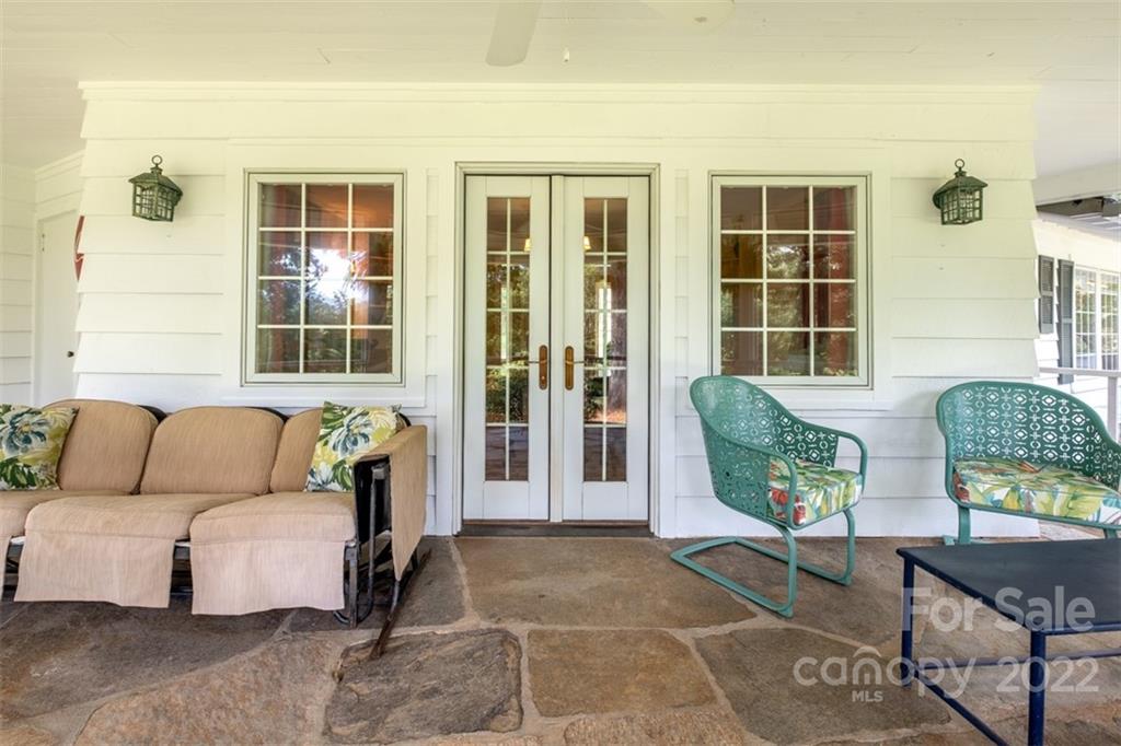 252 Hillbrook Road Tryon, NC 28782 - Photo 40 of 48 a outdoor living space with furniture and a window