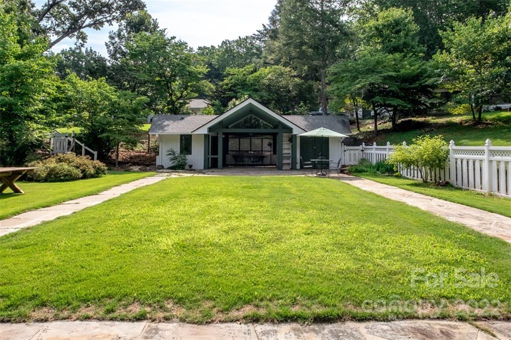 252 Hillbrook Road Tryon, NC 28782 - Photo 46 of 48 a front view of a house with yard