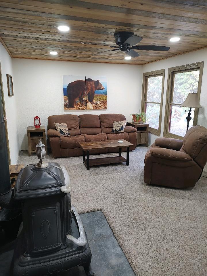 48753 Todd Eymann Road Miramonte, CA 93641 - Photo 8 of 11 a living room with furniture and a window