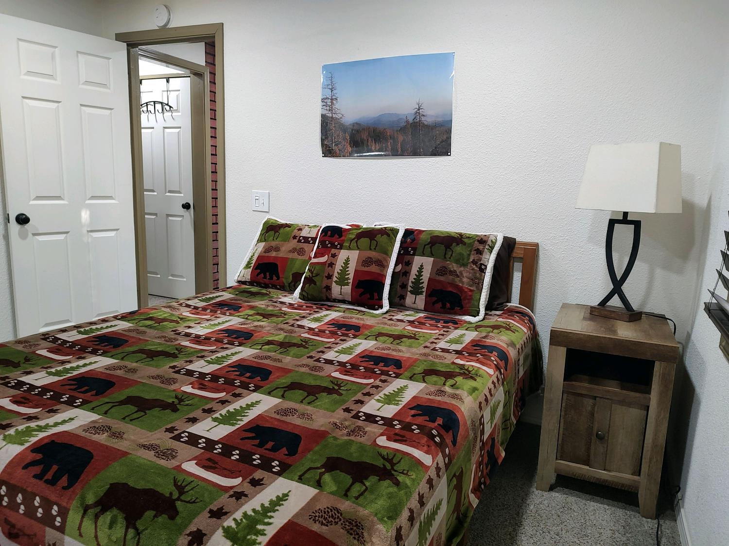 48753 Todd Eymann Road Miramonte, CA 93641 - Photo 9 of 11 a bedroom with a bed and a mirror