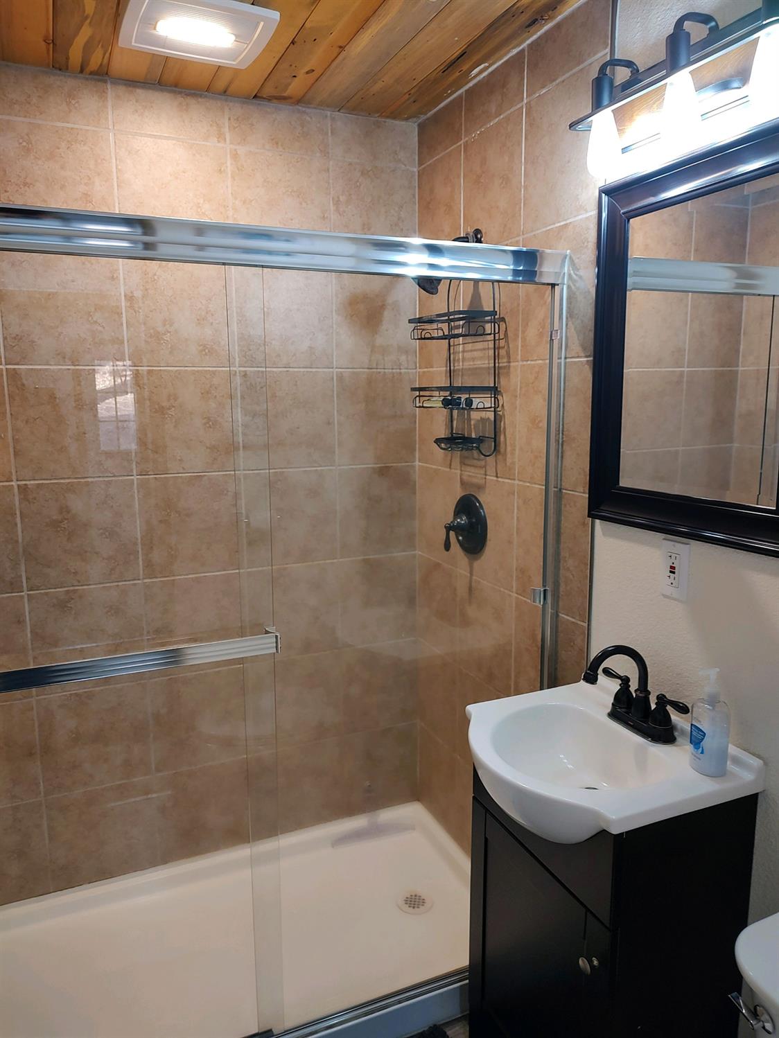 48753 Todd Eymann Road Miramonte, CA 93641 - Photo 10 of 11 a bathroom with a sink and a mirror