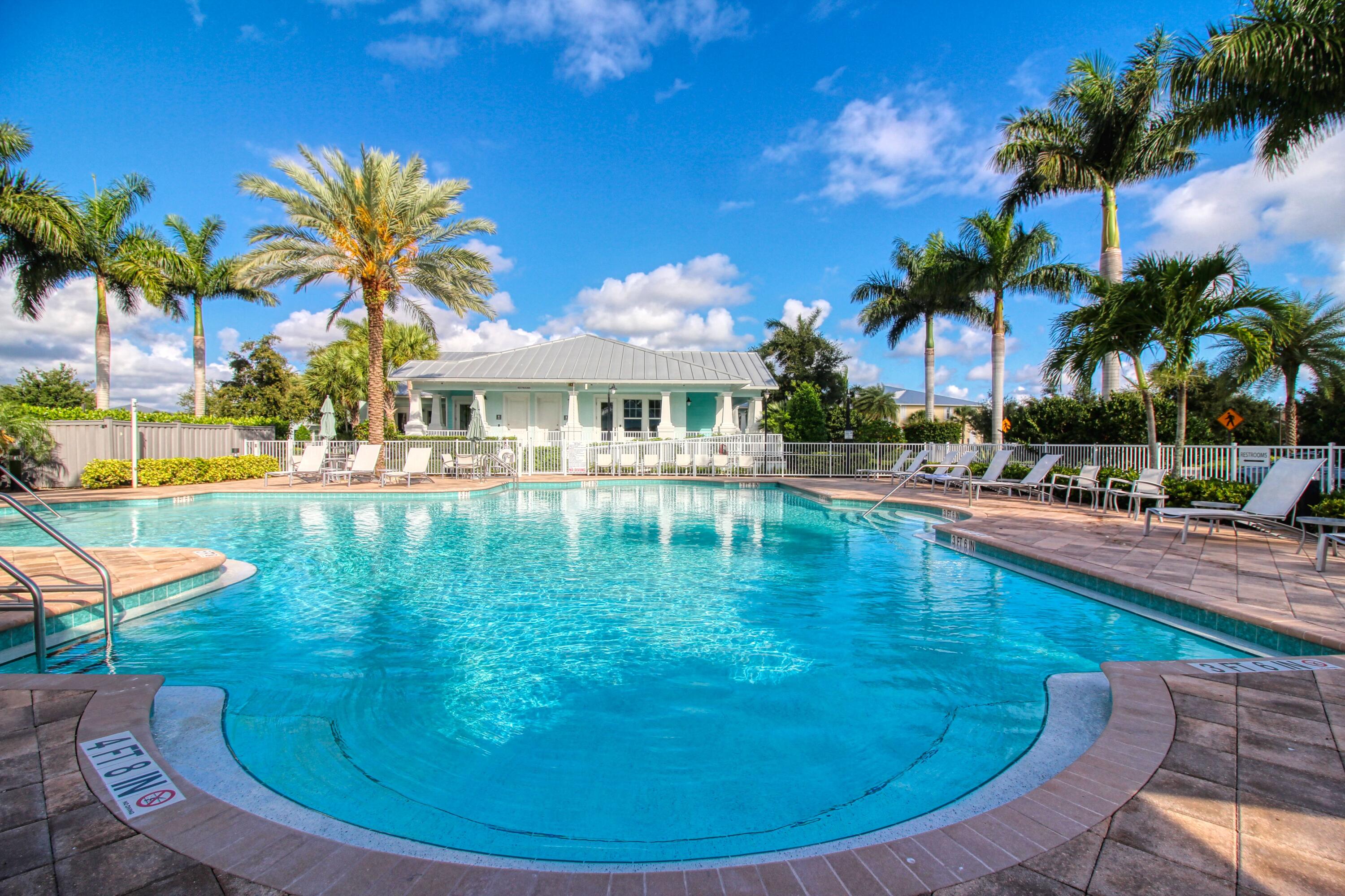 2758 Avalon Way Jupiter, FL 33458 - Photo 39 of 51 a swimming pool with outdoor seating and yard