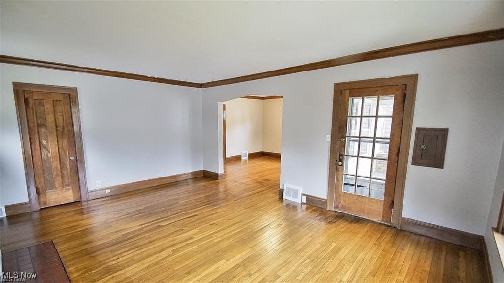 3996 Bluestone Road Cleveland Heights, OH 44121 - Photo 7 of 16 Living Room with hardwood floors and rich wood trim
