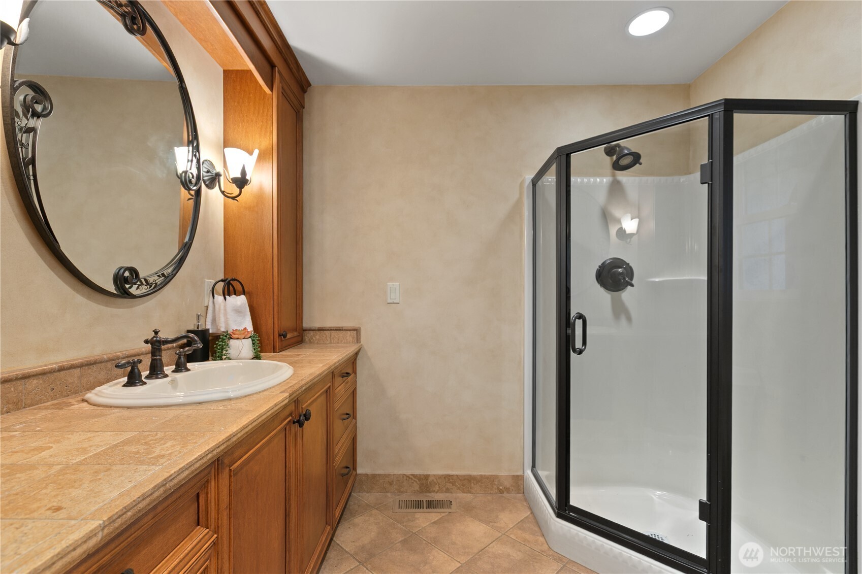 1788 Matz Road Ferndale, WA 98248 - Photo 18 of 40 a bathroom with a mirror sink and shower