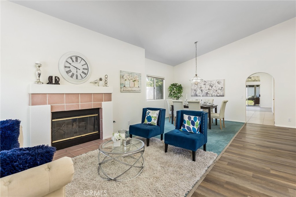 8742 Feathertop Road Riverside, CA 92508 - Photo 11 of 40 The fireplace and high ceiling are enthralling!