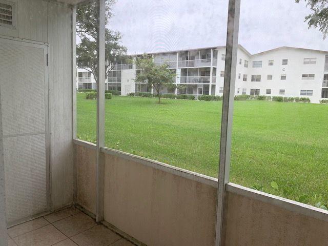 55 Mansfield B, Unit 55 Boca Raton, FL 33434 - Photo 10 of 19 a view of a back yard from a balcony