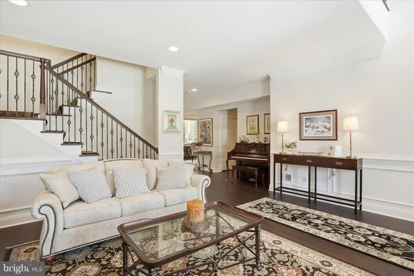 a view of a living room and dining room