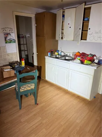 a livingroom with furniture and a window