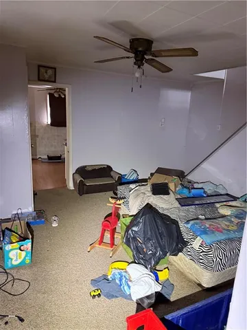 a room with furniture and a flat screen tv