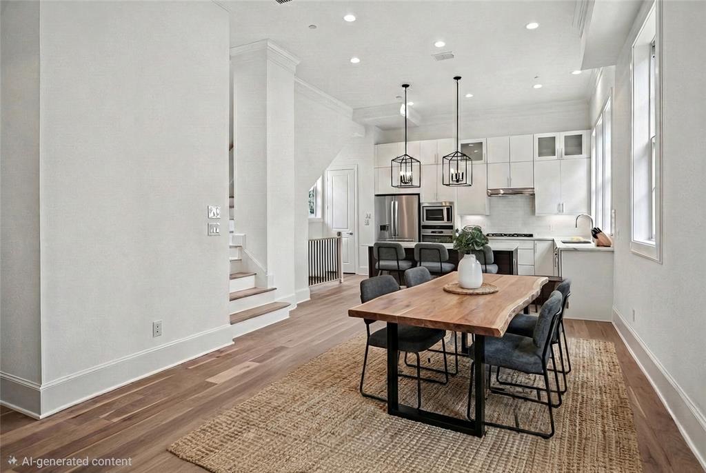 4070 Oak Circle Addison, TX 75001 - Photo 3 of 38 a large kitchen with dining table and chairs