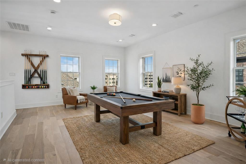 4070 Oak Circle Addison, TX 75001 - Photo 7 of 38 a living room with furniture a table and potted plants