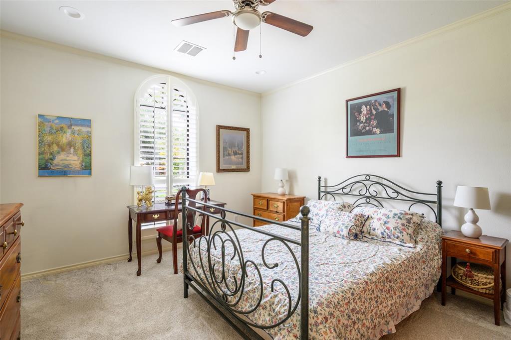 6822 Meadow Road Dallas, TX 75230 - Photo 24 of 35 Secondary Bedroom. Plantation Shutters. Jack and Jill Full Bath. Light and Bright. Carpet replaced 2023.