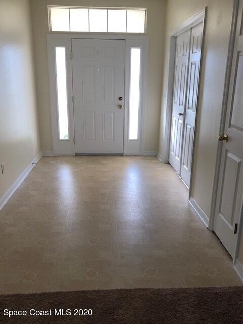 297 Butler Avenue Palm Bay, FL 32907 - Photo 2 of 20 297 foyer