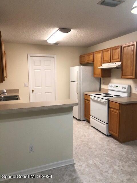 297 Butler Avenue Palm Bay, FL 32907 - Photo 11 of 20 297 Kitchen2