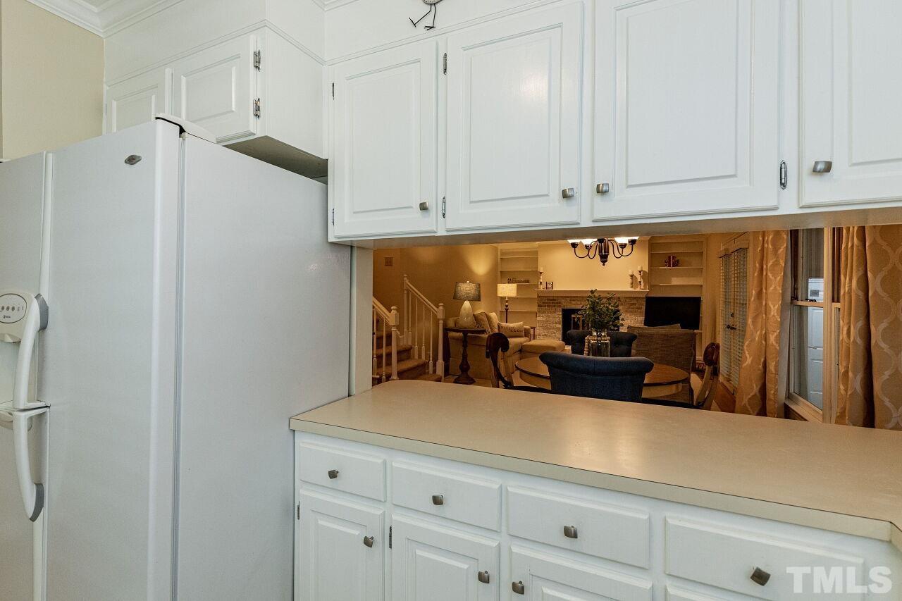 7811 Breckon Way Raleigh, NC 27615 - Photo 14 of 30 a view of a kitchen with appliances and cabinets