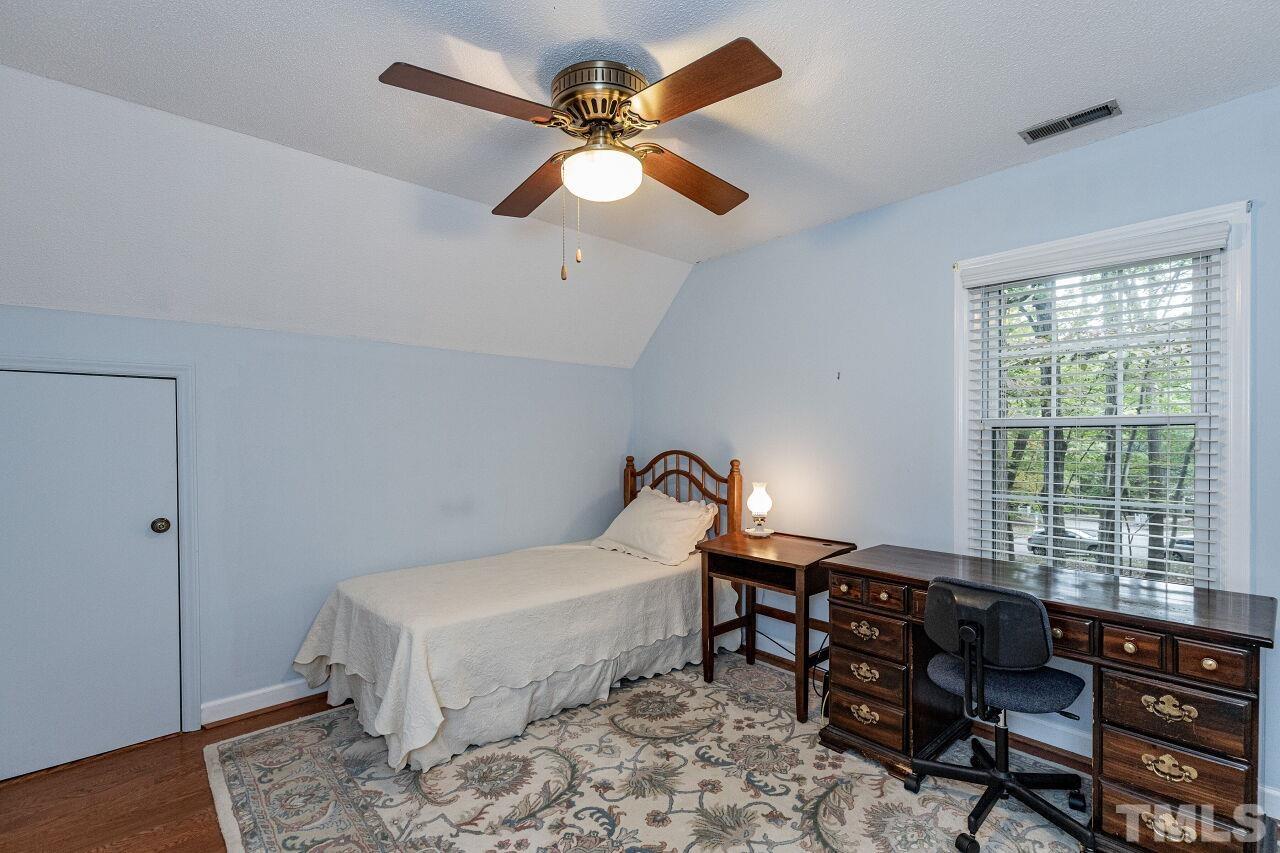 7811 Breckon Way Raleigh, NC 27615 - Photo 27 of 30 a room with furniture