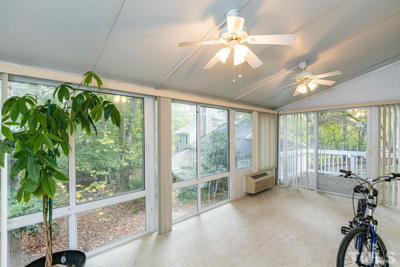 7811 Breckon Way Raleigh, NC 27615 - Photo 28 of 30 a view of a livingroom with furniture window and outside view