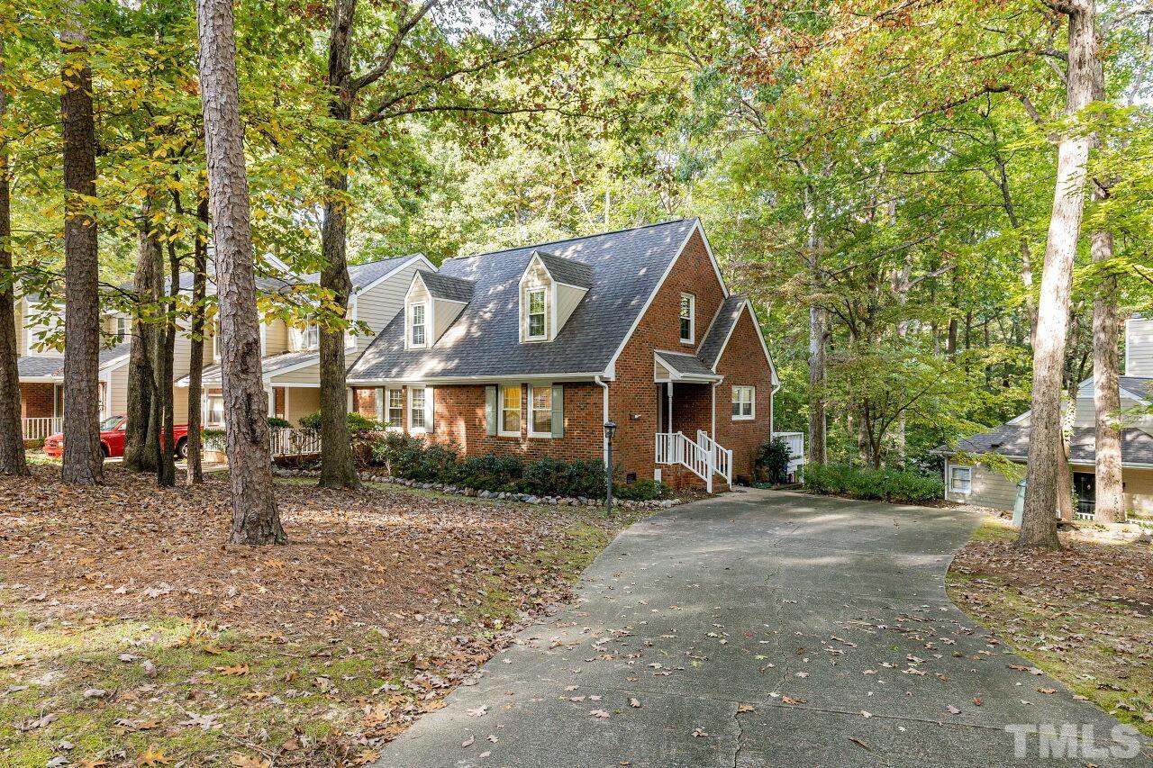 7811 Breckon Way Raleigh, NC 27615 - Photo 4 of 30 a view of a house with a yard