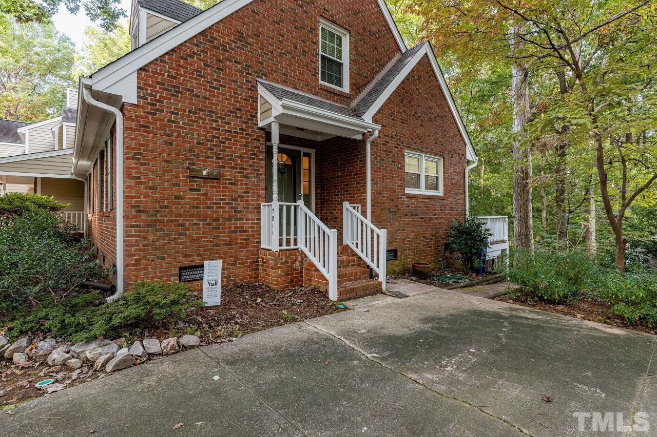 7811 Breckon Way Raleigh, NC 27615 - Photo 5 of 30 a front view of a house with a yard