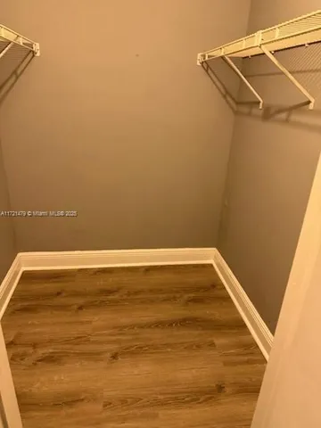 a view of a room with racks on the wall