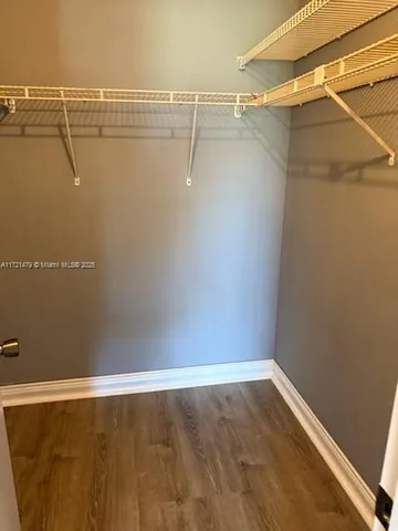 a view of a room with racks on the wall