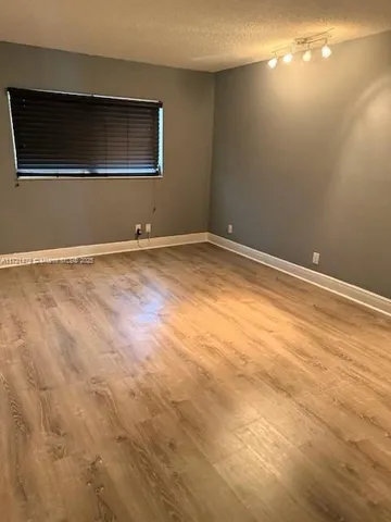 a view of a lake with a city