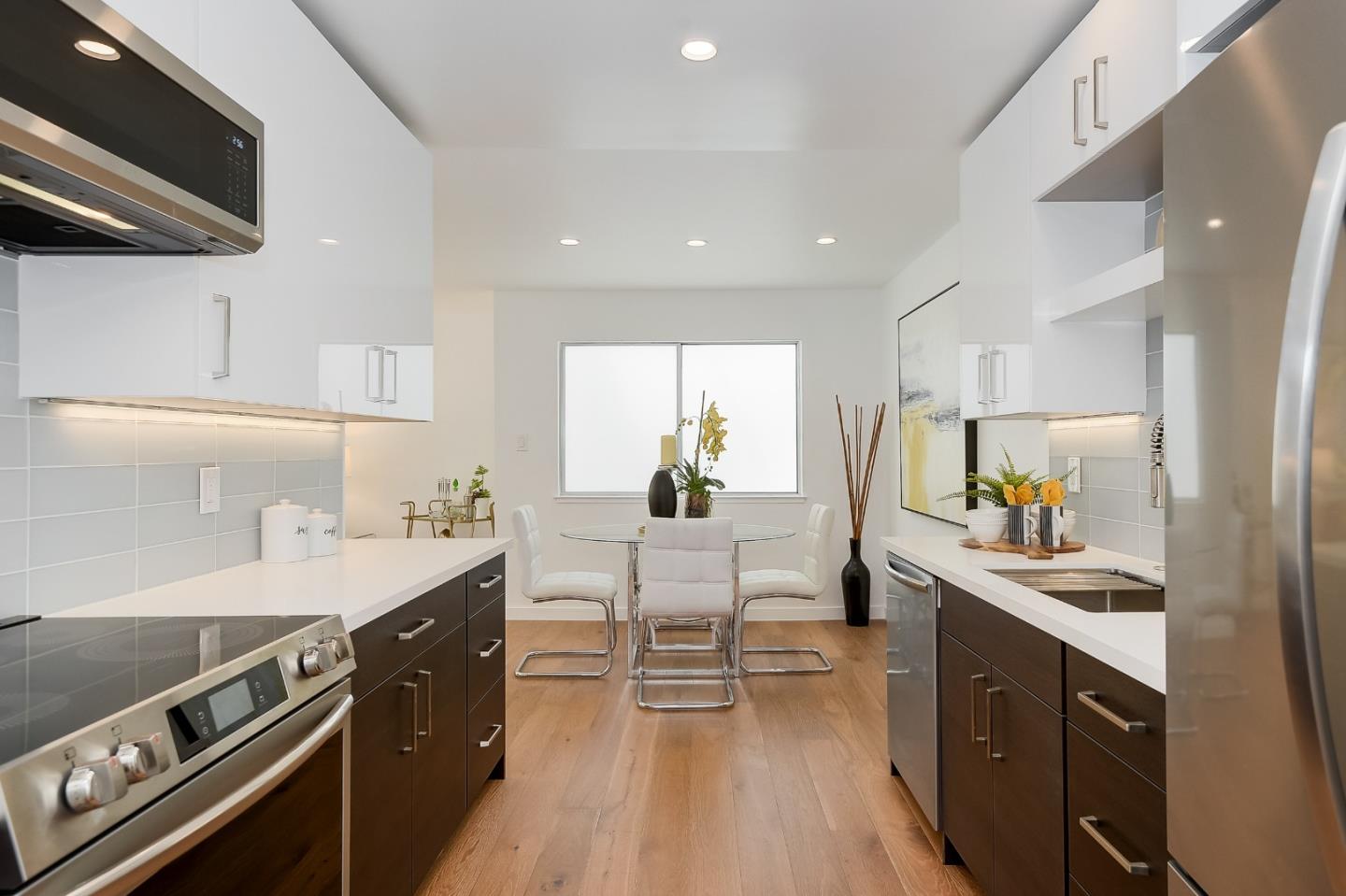 21 Willow Road, Unit 24 Menlo Park, CA 94025 - Photo 5 of 22 a kitchen with a sink appliances and cabinets
