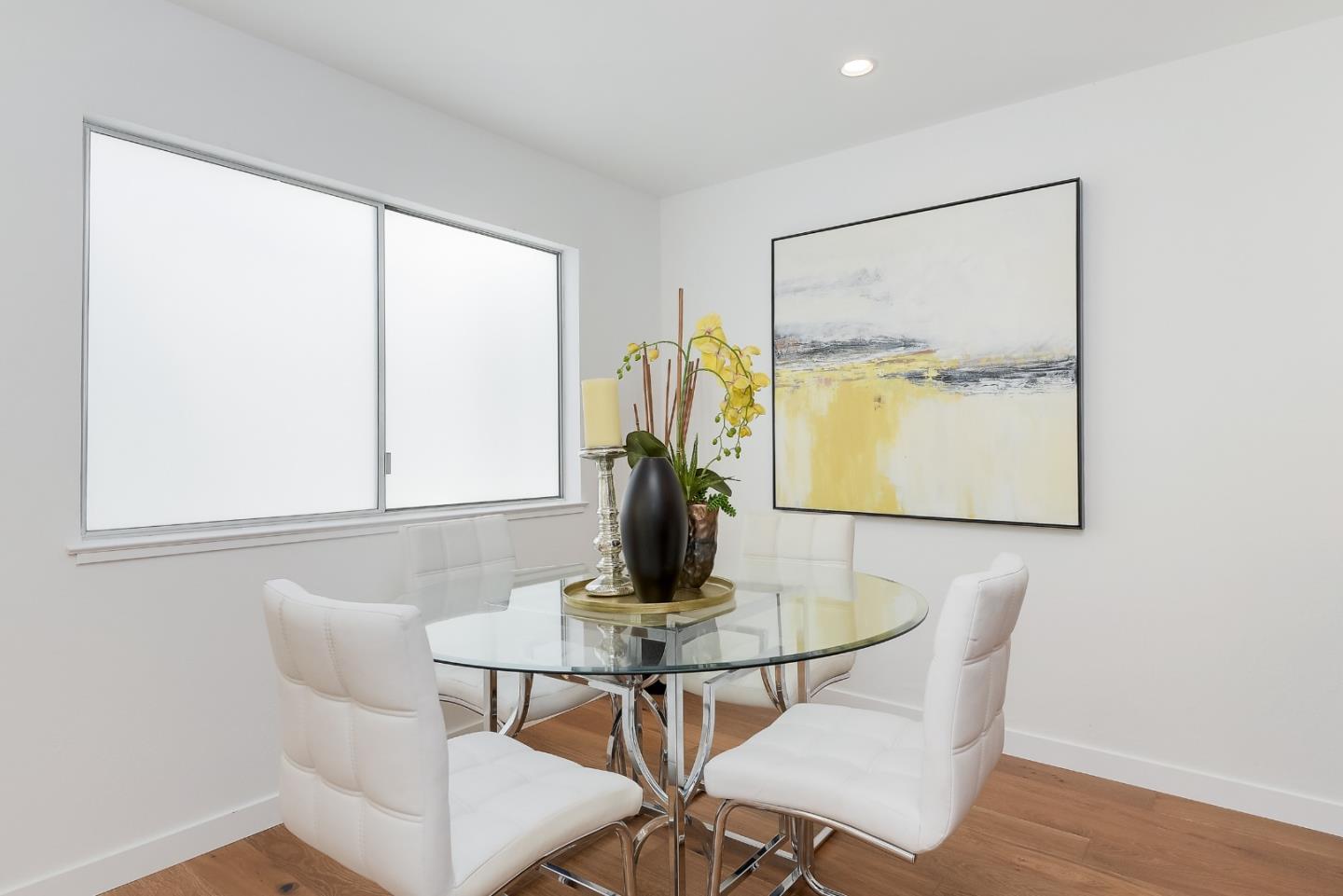 21 Willow Road, Unit 24 Menlo Park, CA 94025 - Photo 7 of 22 a view of a dining room with furniture window and wooden floor