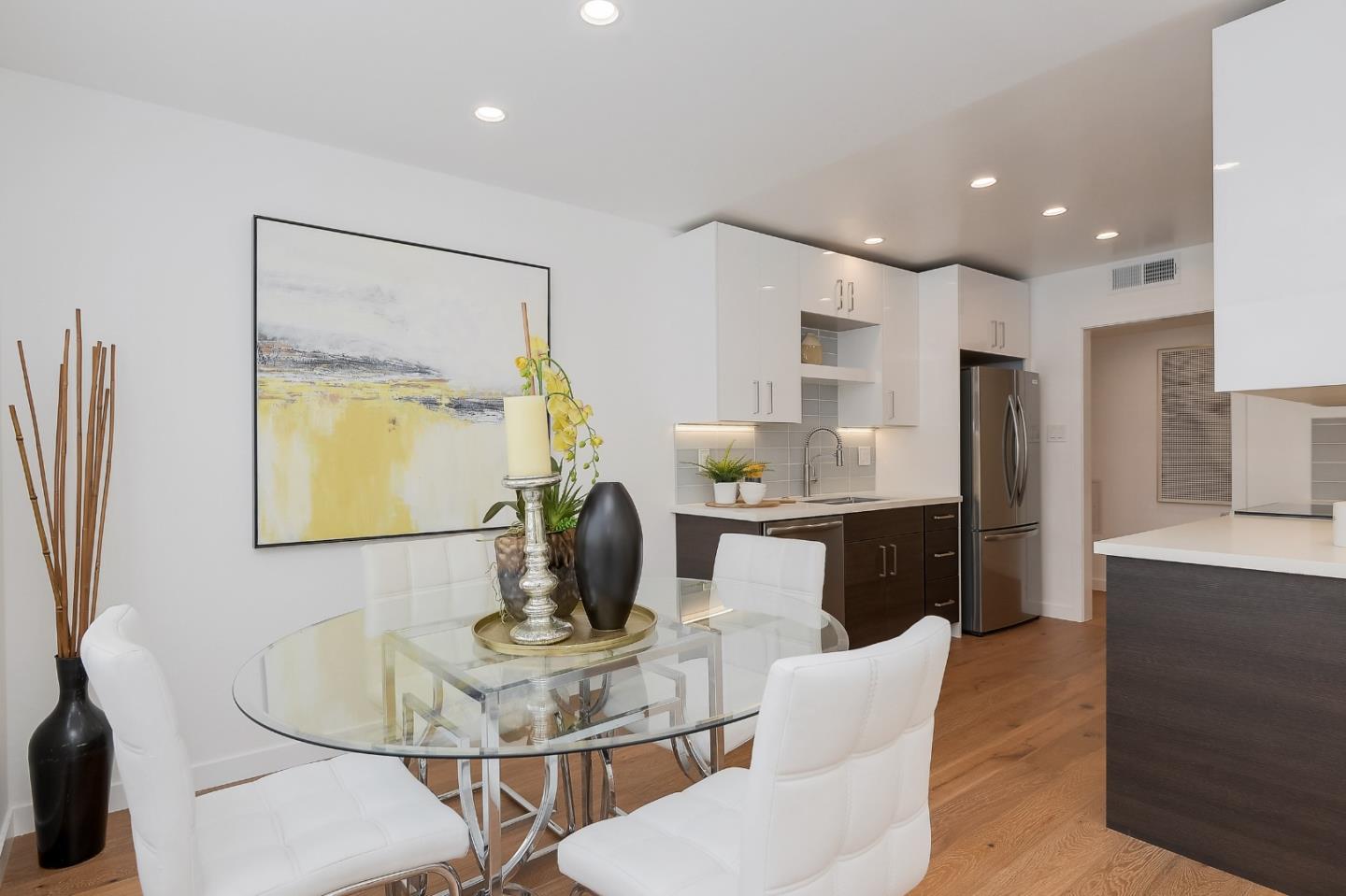 21 Willow Road, Unit 24 Menlo Park, CA 94025 - Photo 8 of 22 a dining room with furniture a window and kitchen view