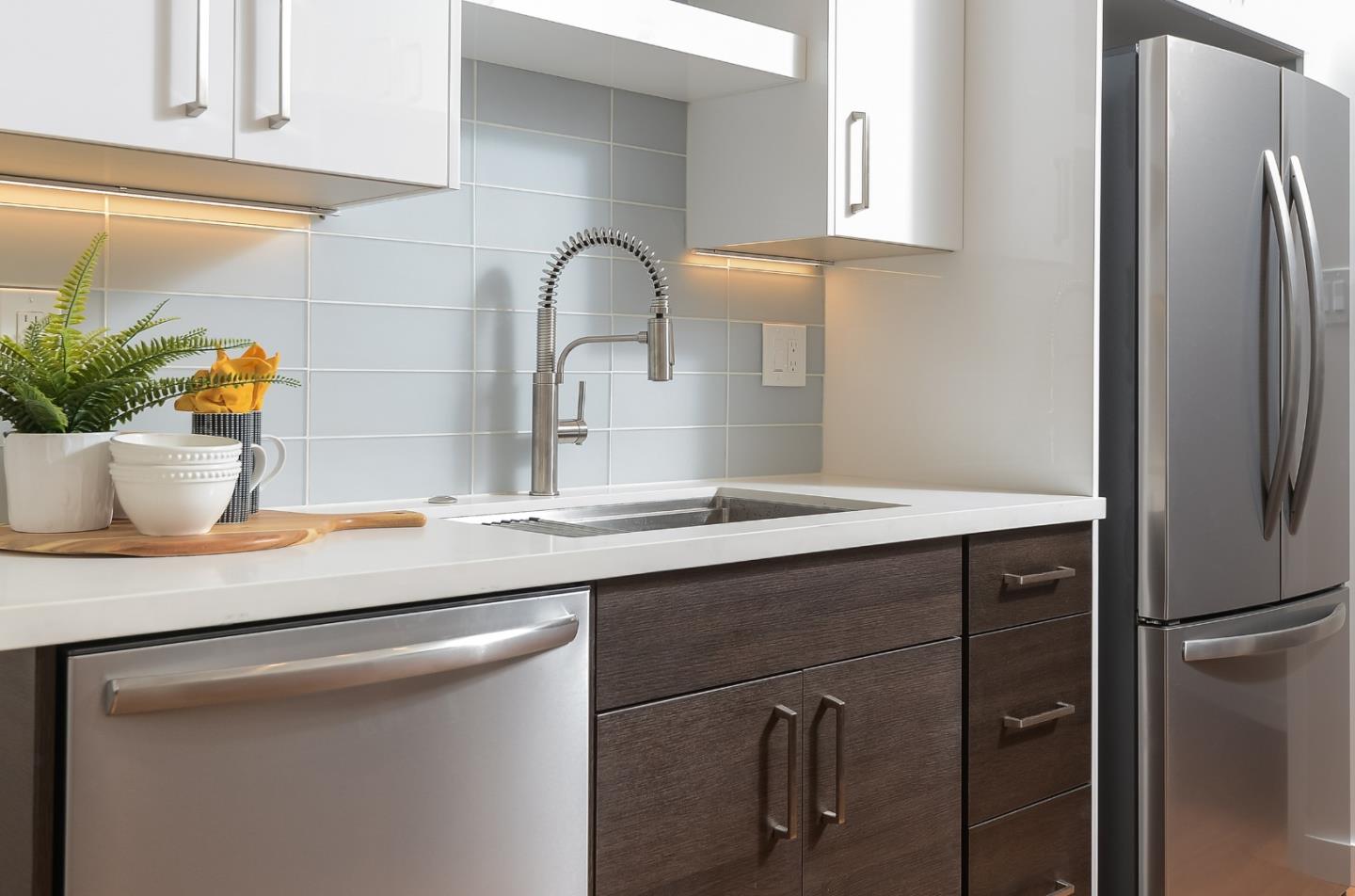 21 Willow Road, Unit 24 Menlo Park, CA 94025 - Photo 10 of 22 a kitchen with a refrigerator and a sink