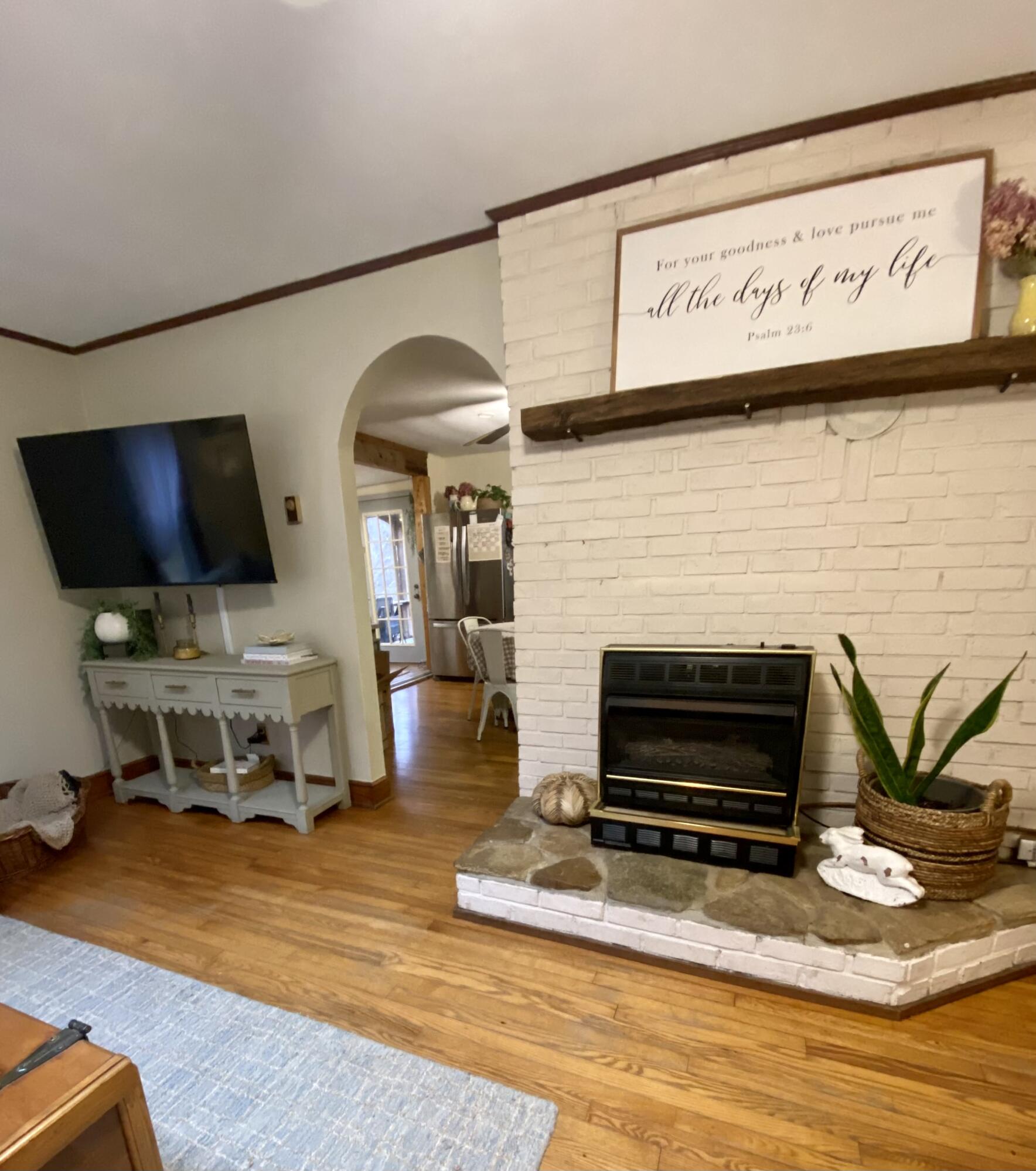 545 Slaughter Hill Road Northwest Indian Valley, VA 24105 - Photo 2 of 31 a living room with furniture and a flat screen tv