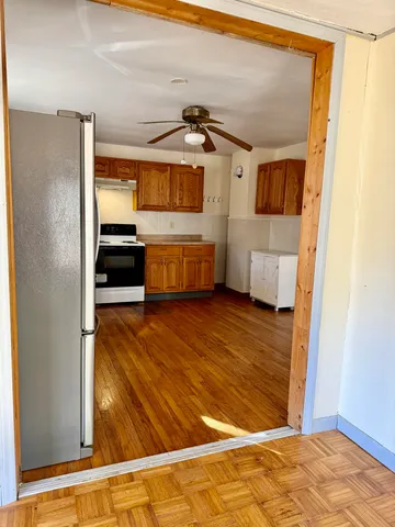 a view of a living room with a flat screen tv
