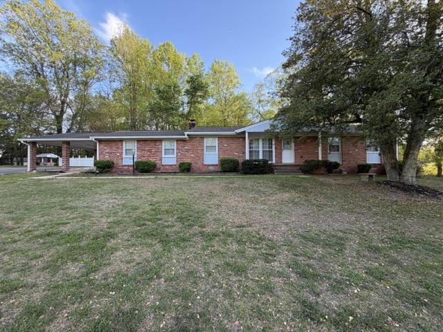 6109 Cracklingtown Road Hughesville, MD 20637 - Photo 4 of 25 front view of a house with a yard