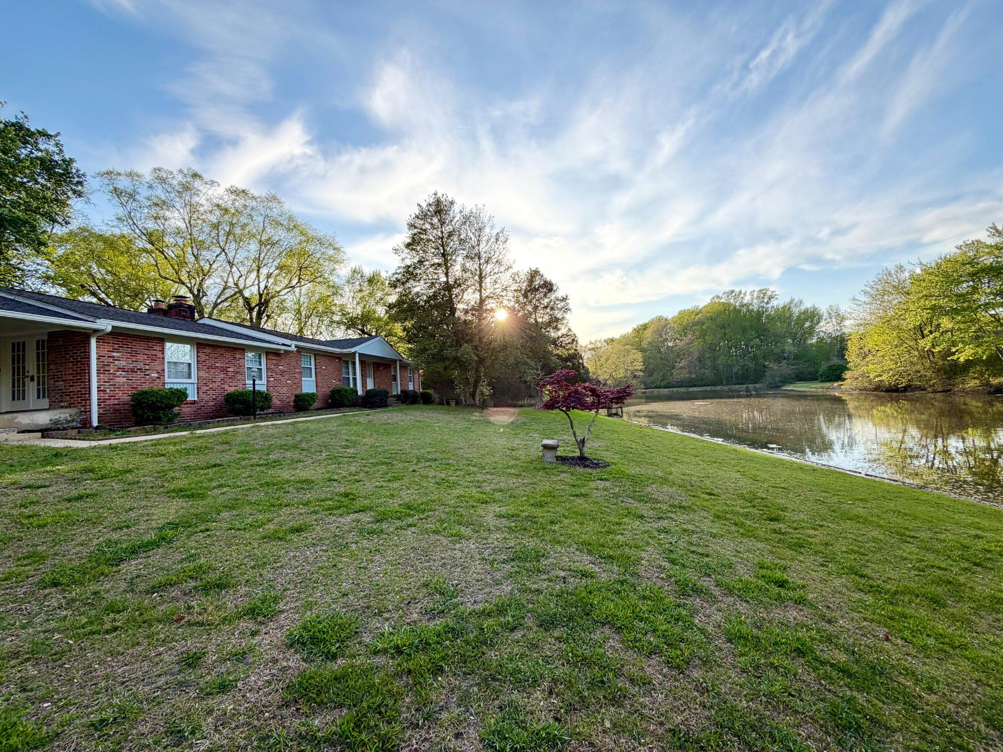 6109 Cracklingtown Road Hughesville, MD 20637 - Photo 5 of 25 a view of a house with a backyard