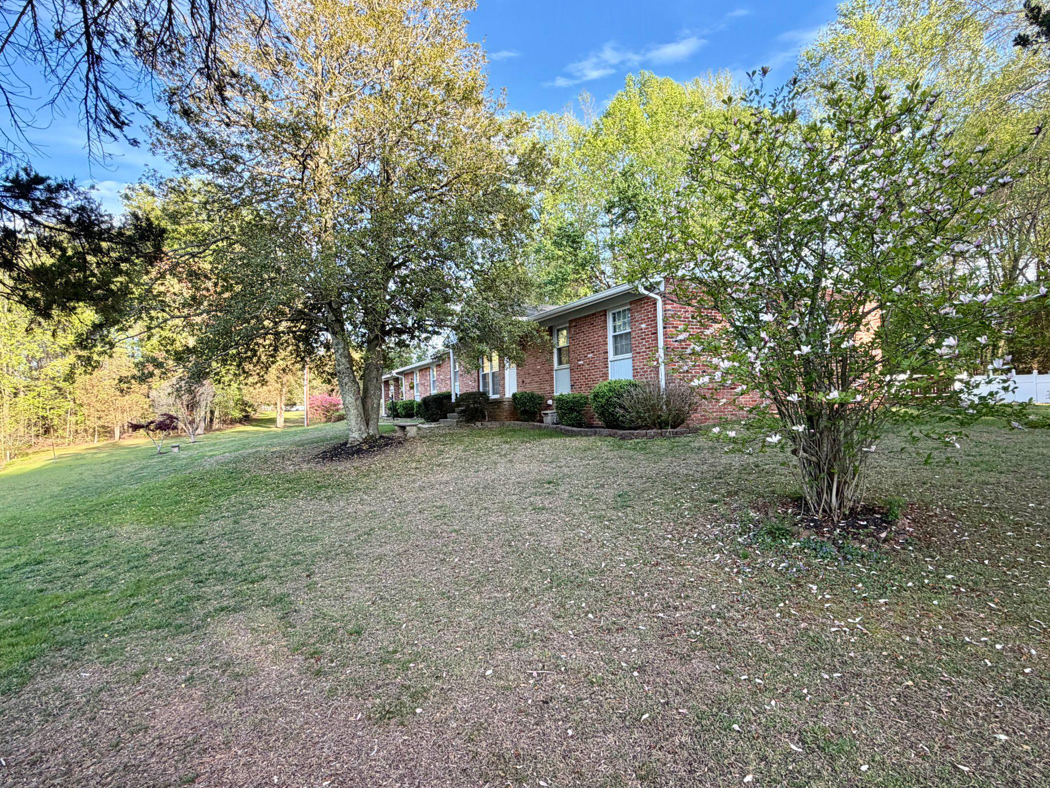 6109 Cracklingtown Road Hughesville, MD 20637 - Photo 7 of 25 a view of backyard of house with green space